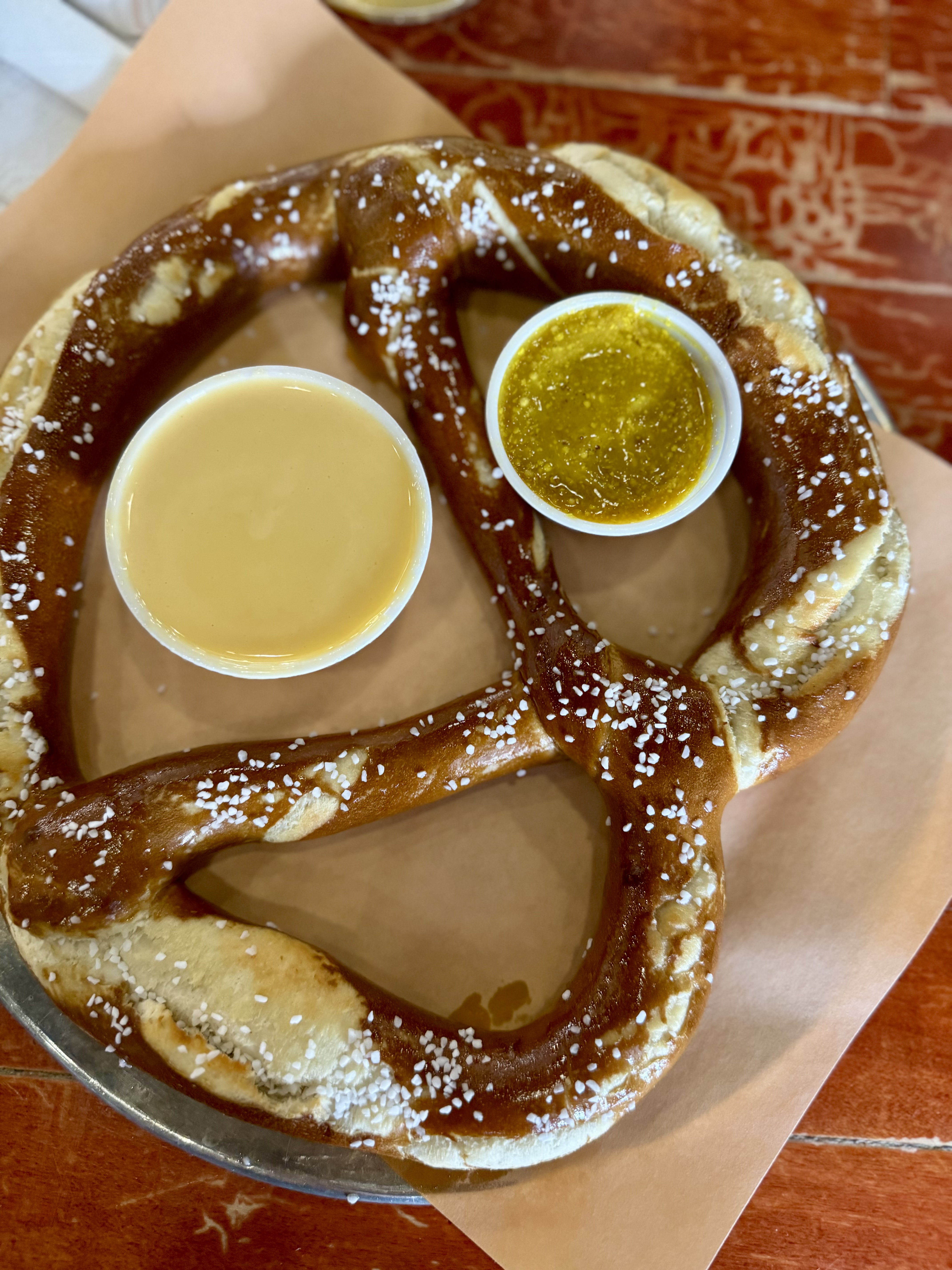 pretzel and queso and mustard