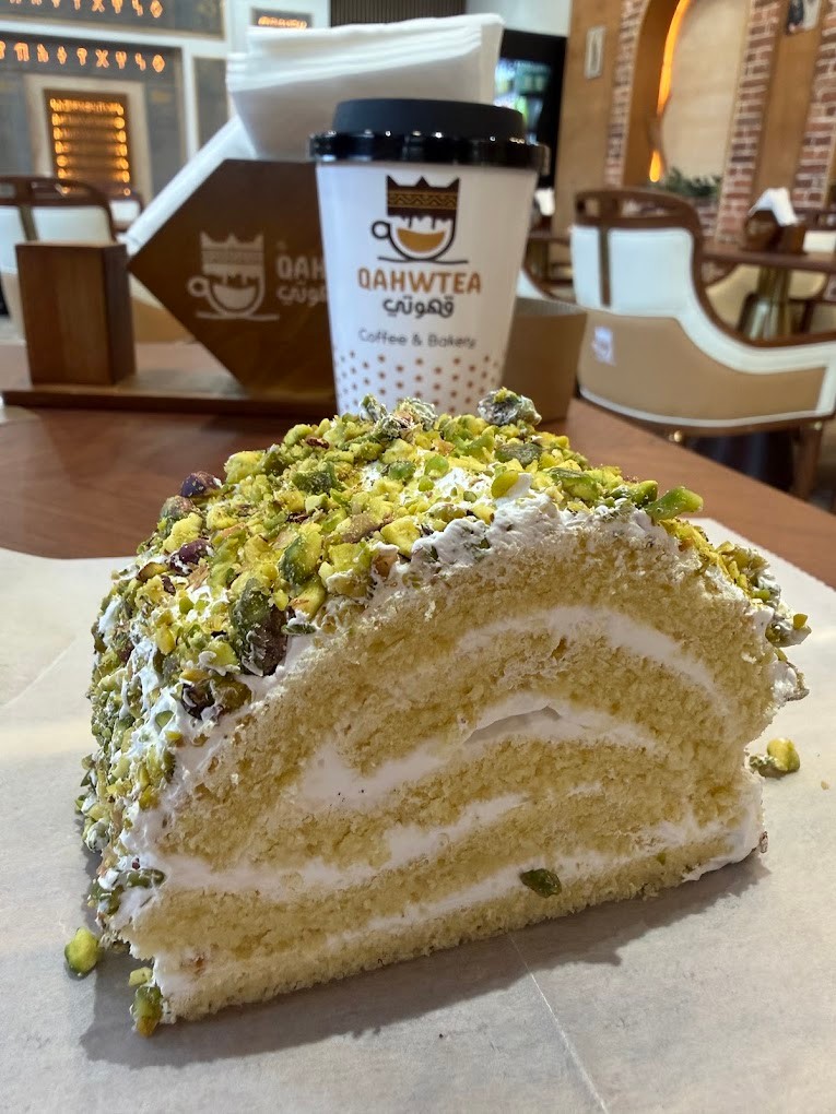 Qahwtea Coffee & Bakery: Pistachio cake clouds with a strong coffee front rolling through.