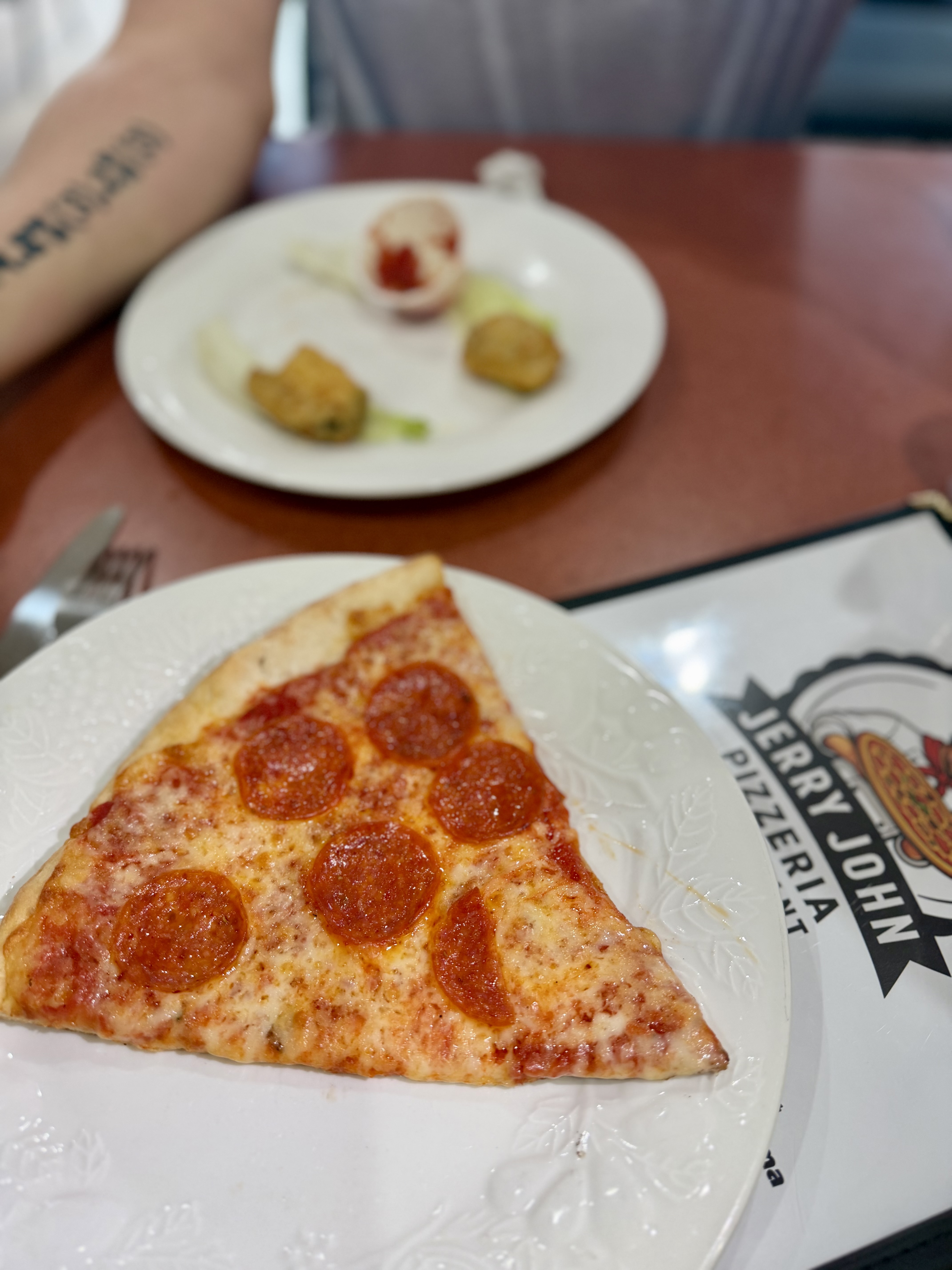 Pizza by the slice at Jerry John
