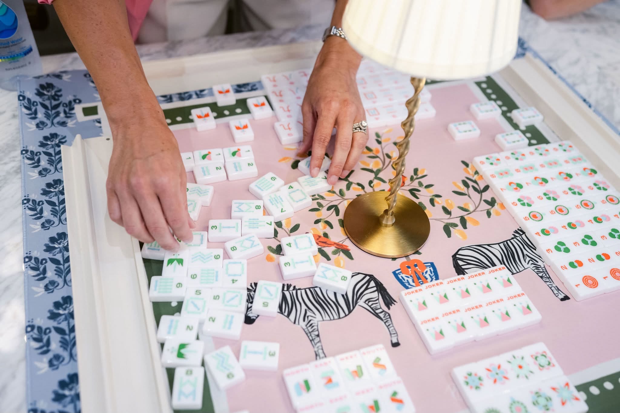 Mahjong and hands close up