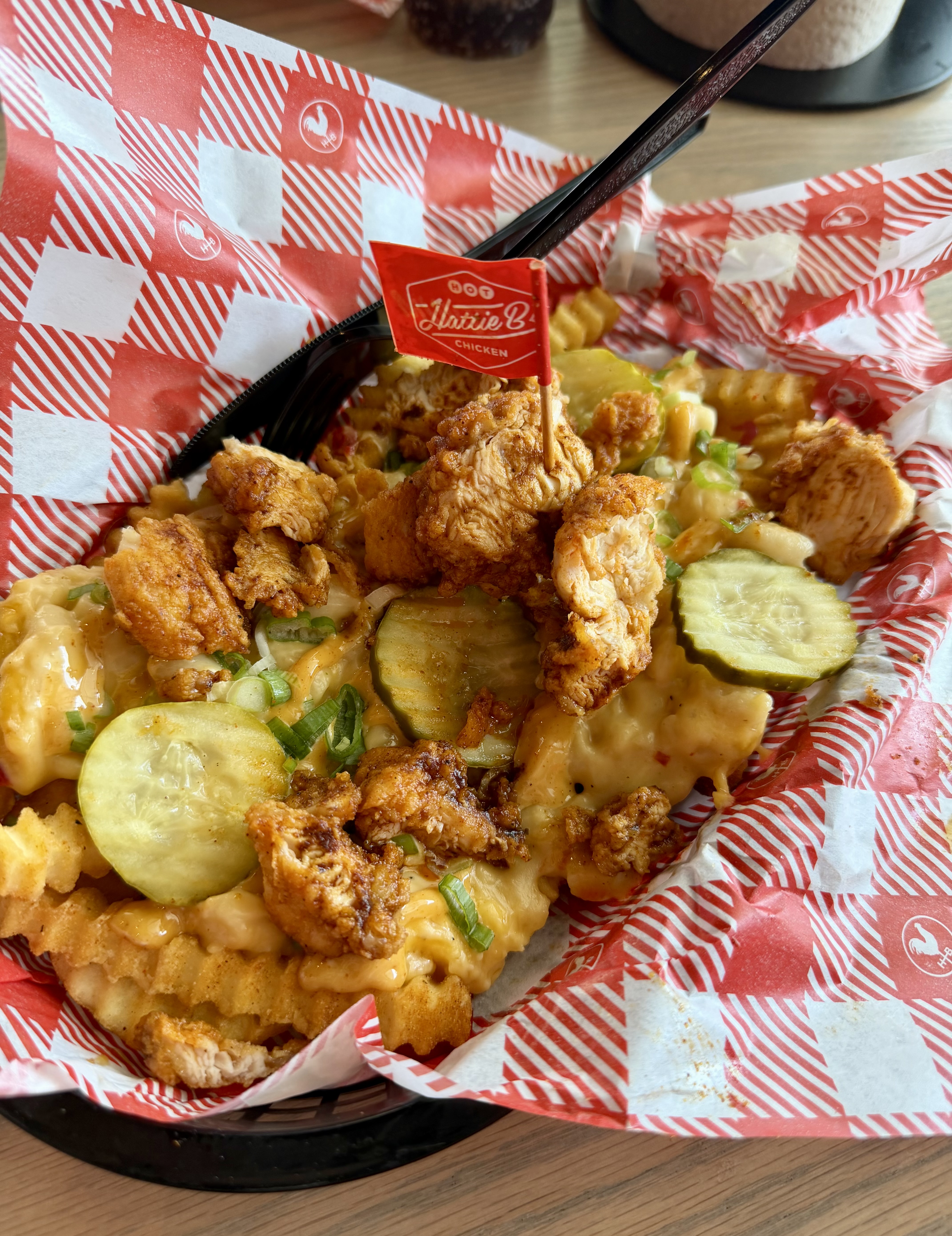 Hattie B’s "Dirty Bird" loaded Fries: Hot chicken conditions remain hazardous to white shirts and completely worth it.