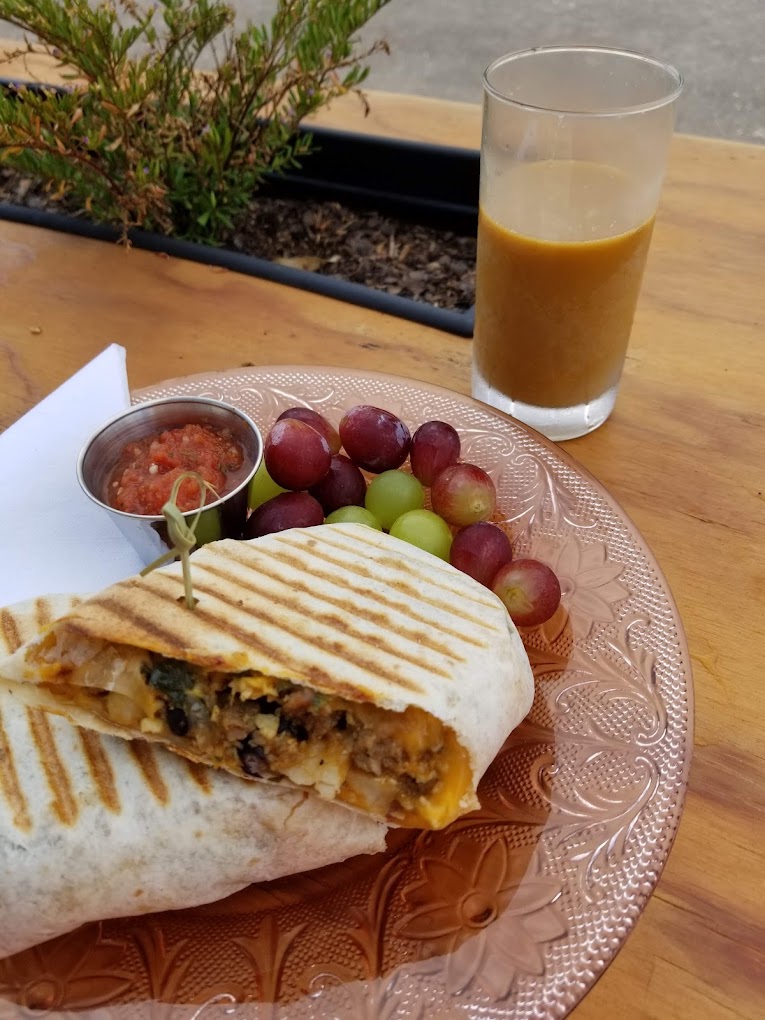 stacked breakfast burrito filled with eggs